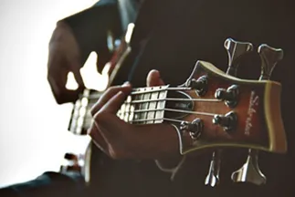 Man playing guitar.