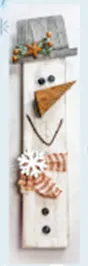 Snowman on wooden plaque.