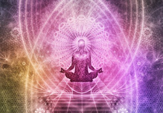 Image of person sitting cross legged surrounded by pink aura.